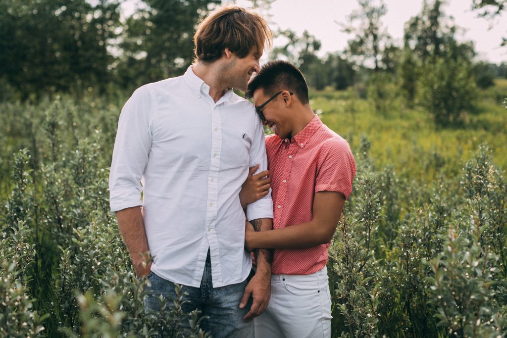 Fun summer couples session in Calgary, Alberta at Fish Creek Provincial Park