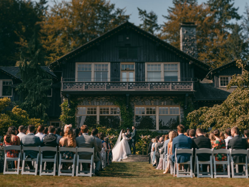 Destination Wedding in Vancouver at Stanley Park Pavillion - couple gets married in front of the Stanley Park Pavilion